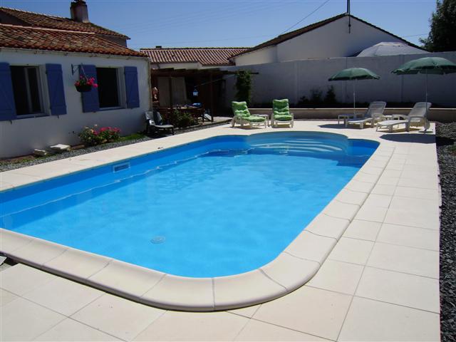Swimming pool heated by solar panals, terrace