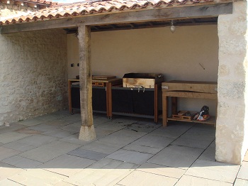 summer kitchen complete with BBQ - great for al fresco dining